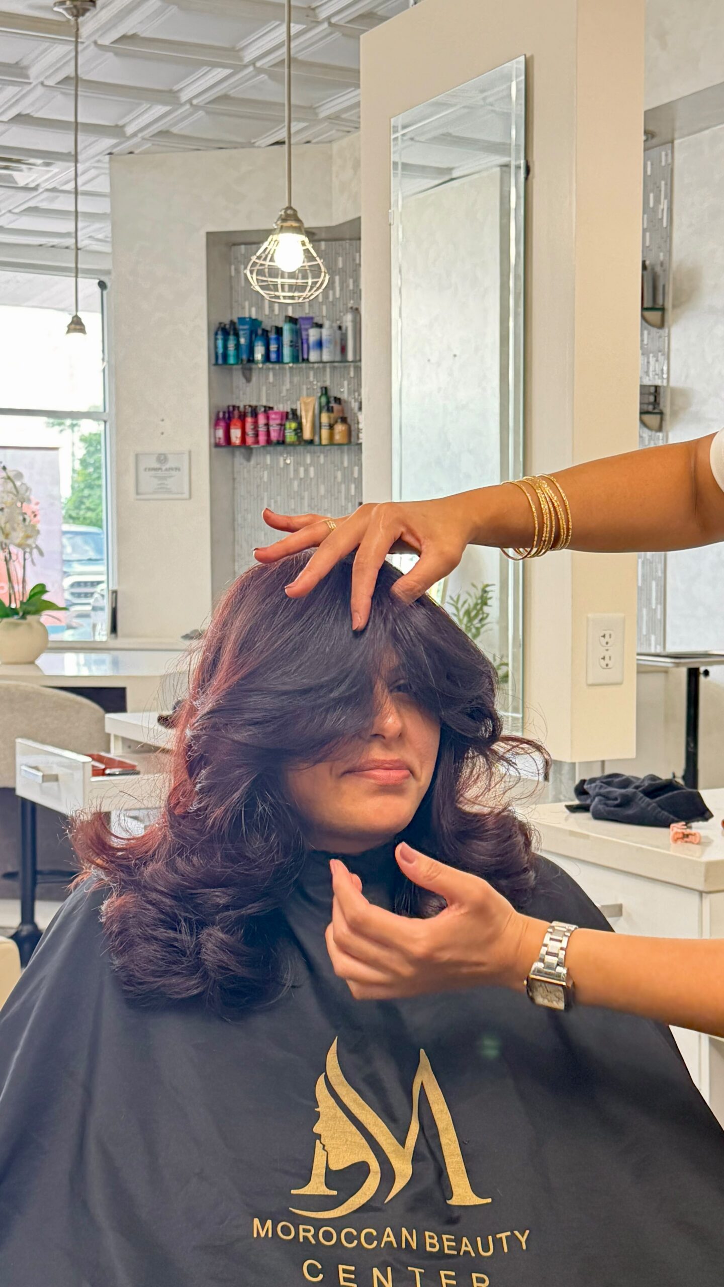 Rich custom hair color with face-framing styling